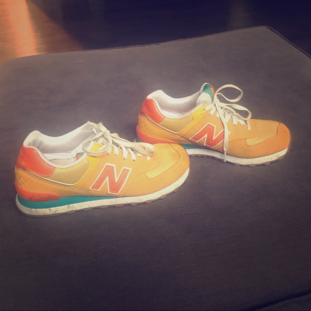 New Balance 574.  Size 7 men’s, 8.5 women’s.